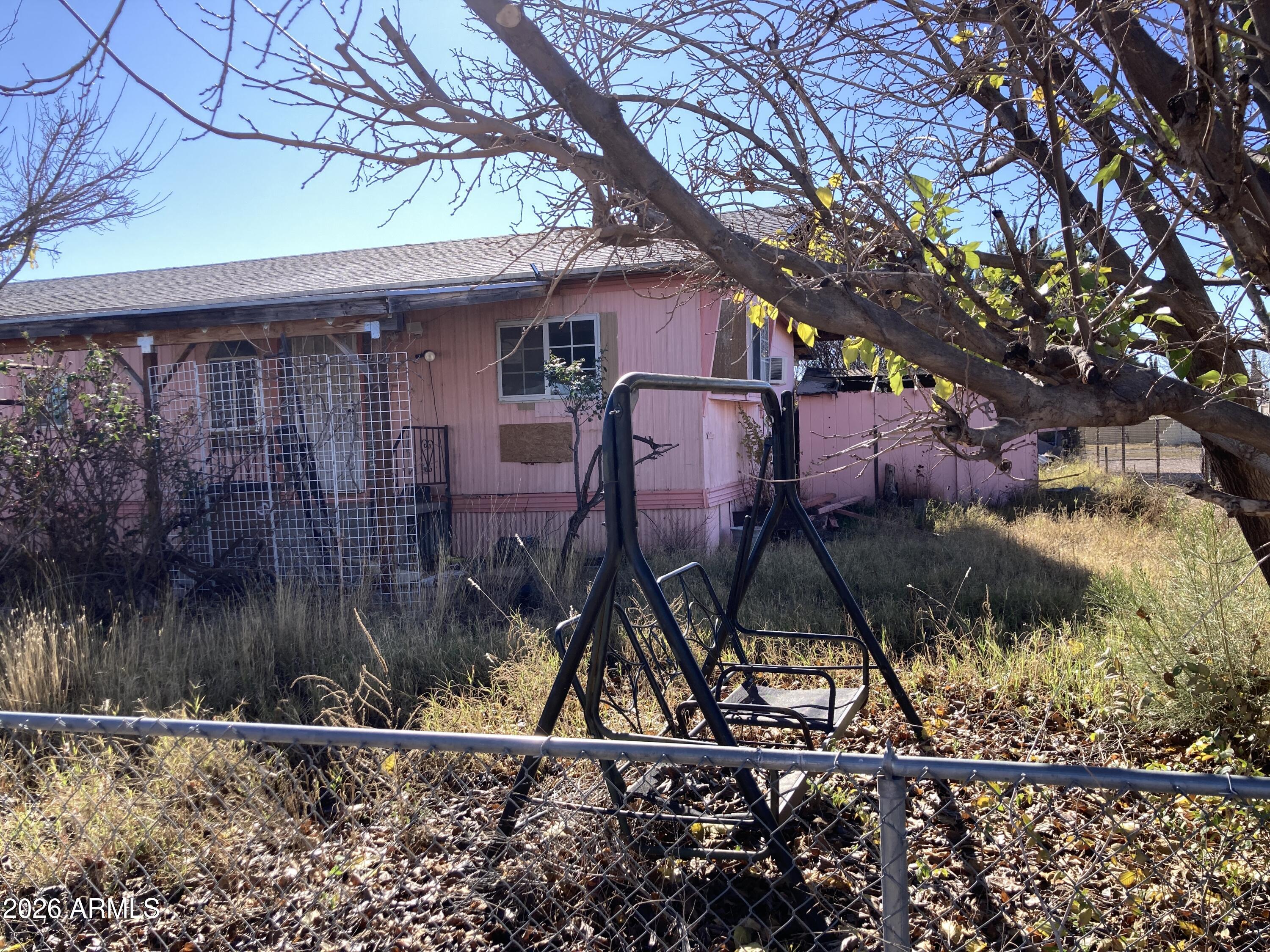 1639 East 19th Street Douglas, AZ 85607 - Photo 3 of 3 a front view of a house with garden