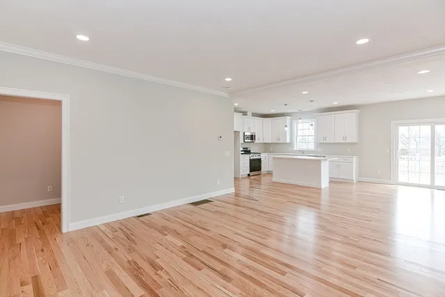 a view of kitchen with wooden floor