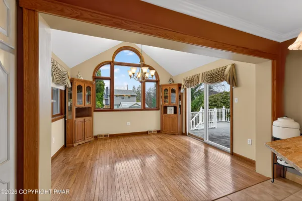 a bathroom with a sink mirror and toilet