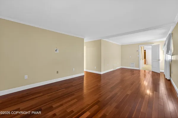 a room with furniture and window