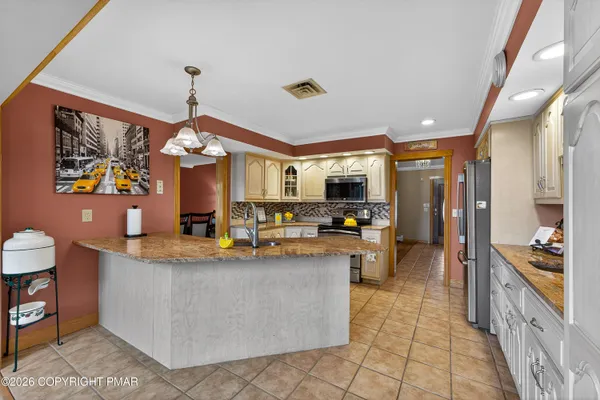 a view of a house with wooden floor and stairs