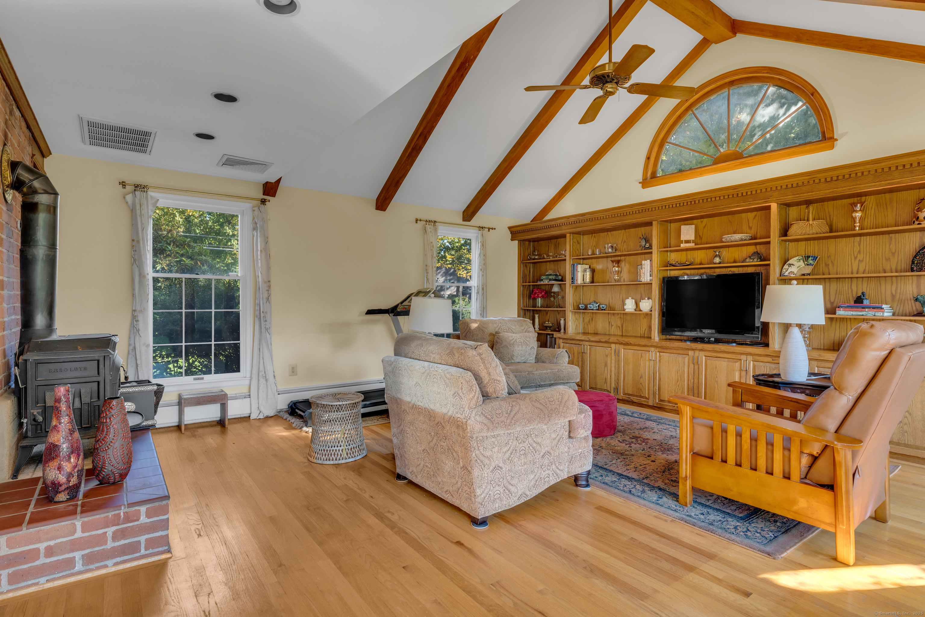 1060 Ridge Road Hamden, CT 06517 - Photo 11 of 40 a living room with furniture and a flat screen tv