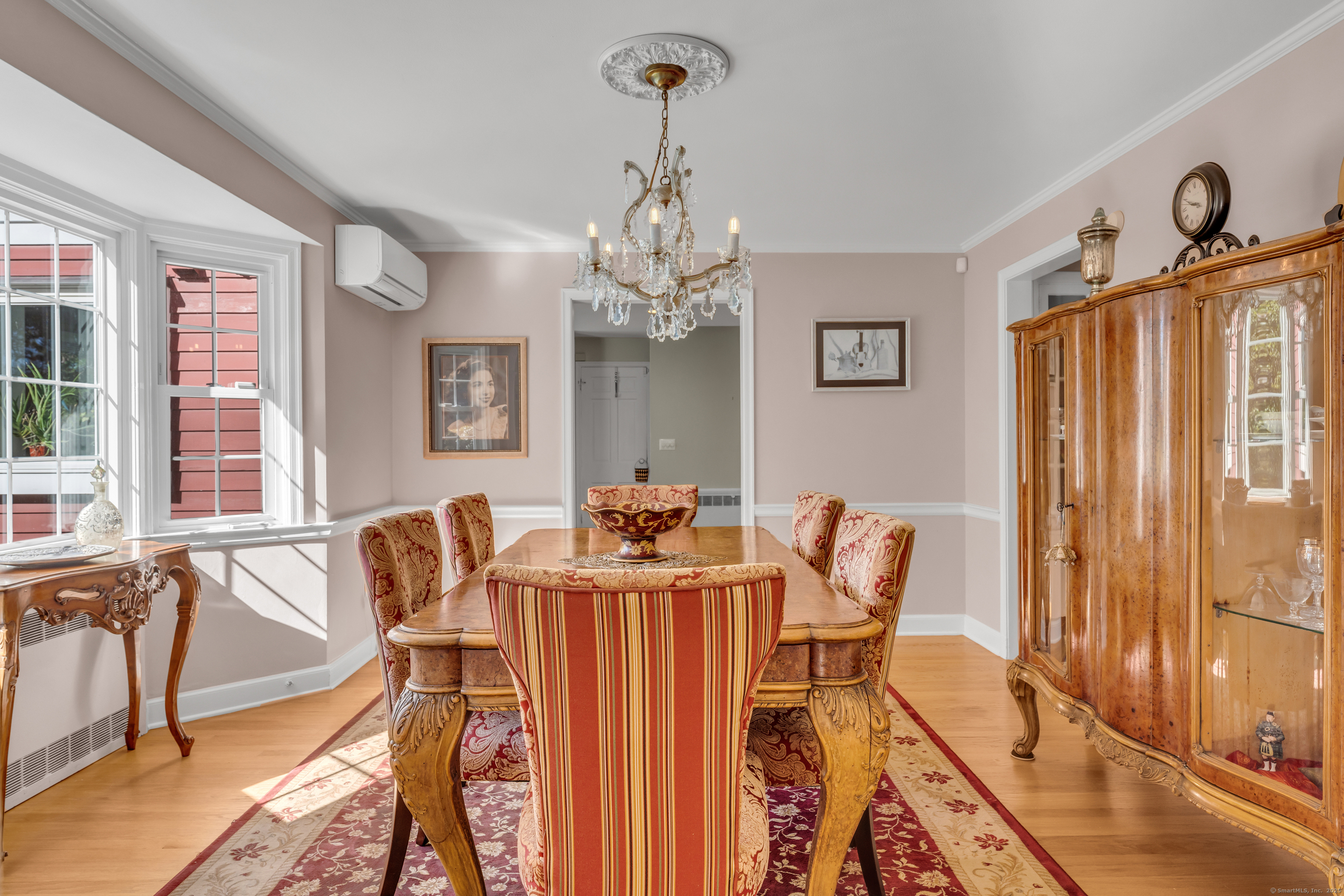 1060 Ridge Road Hamden, CT 06517 - Photo 13 of 40 a view of a dining room with furniture and chandelier