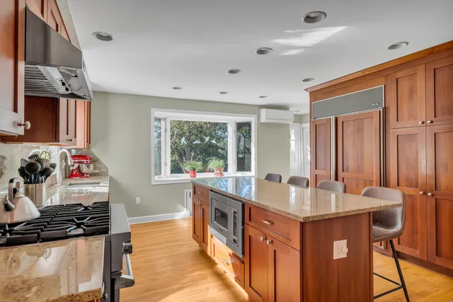 a very nice looking kitchen with a large window