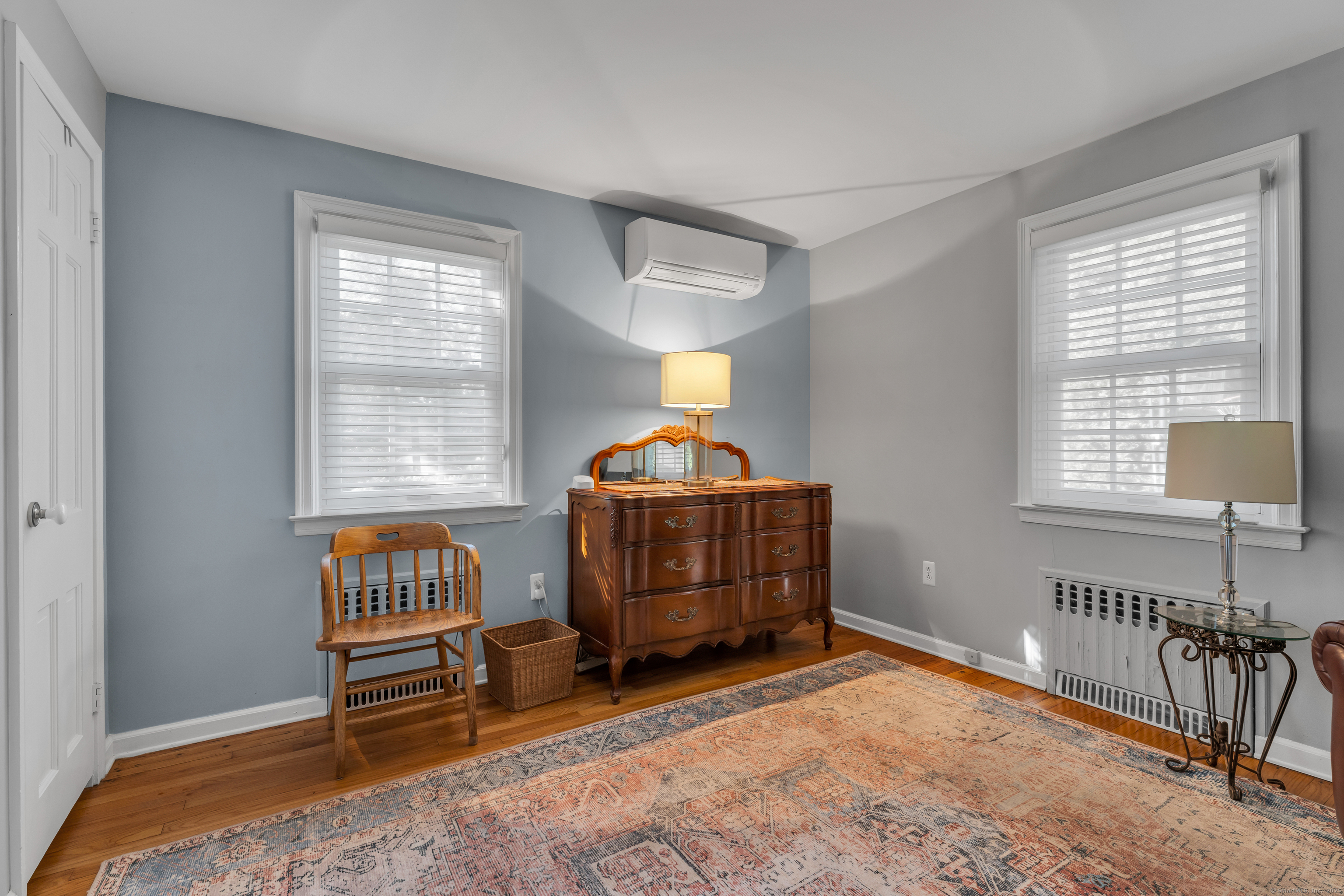 1060 Ridge Road Hamden, CT 06517 - Photo 20 of 40 a bedroom with furniture and a window