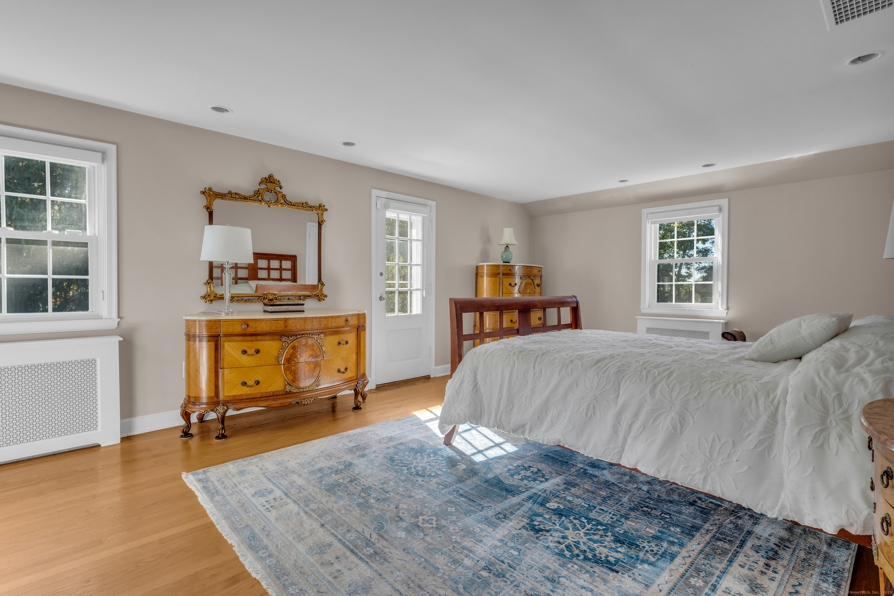 1060 Ridge Road Hamden, CT 06517 - Photo 25 of 40 a bed room with a bed and a television