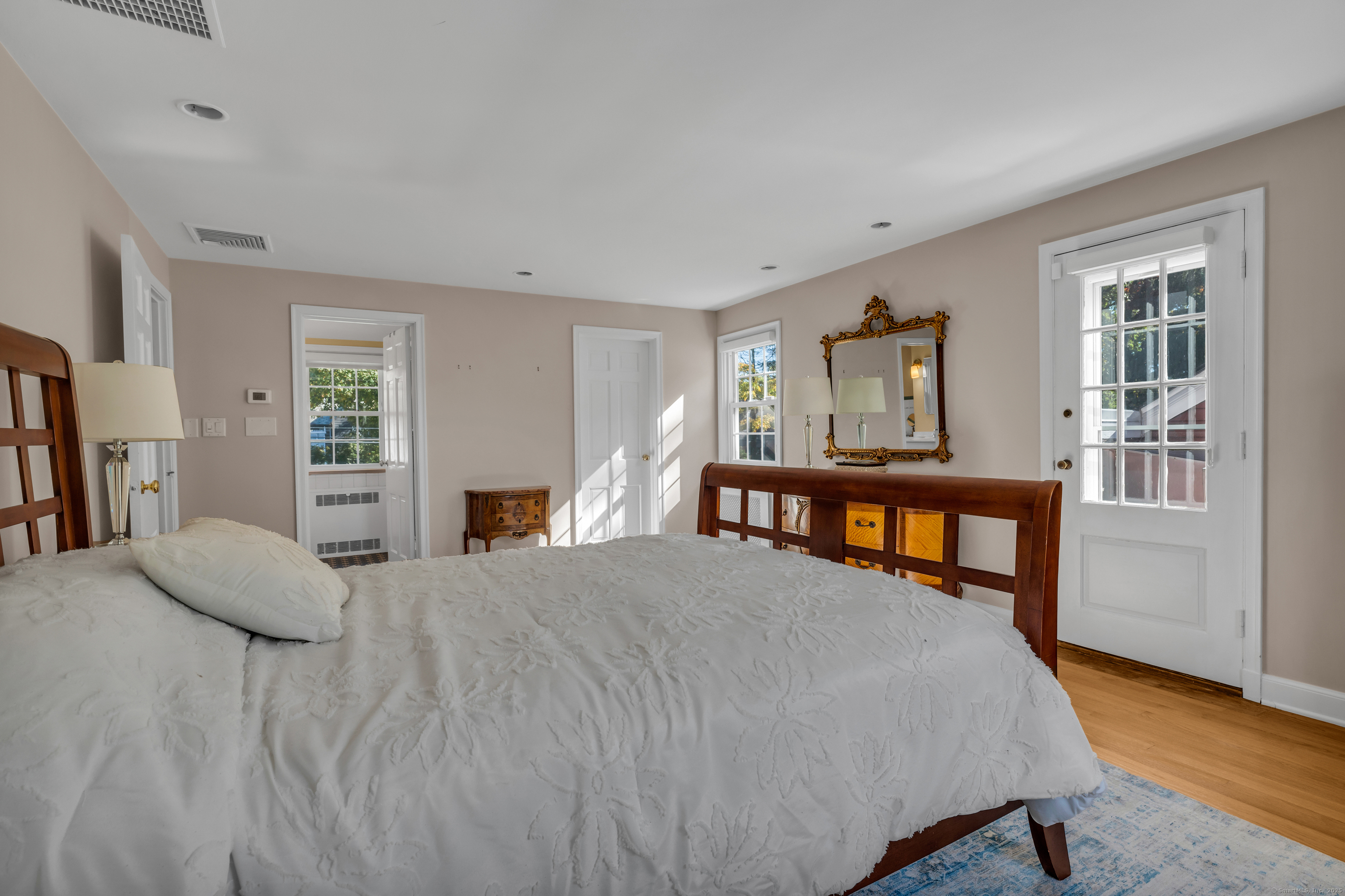 1060 Ridge Road Hamden, CT 06517 - Photo 26 of 40 a bedroom with a bed and a large window