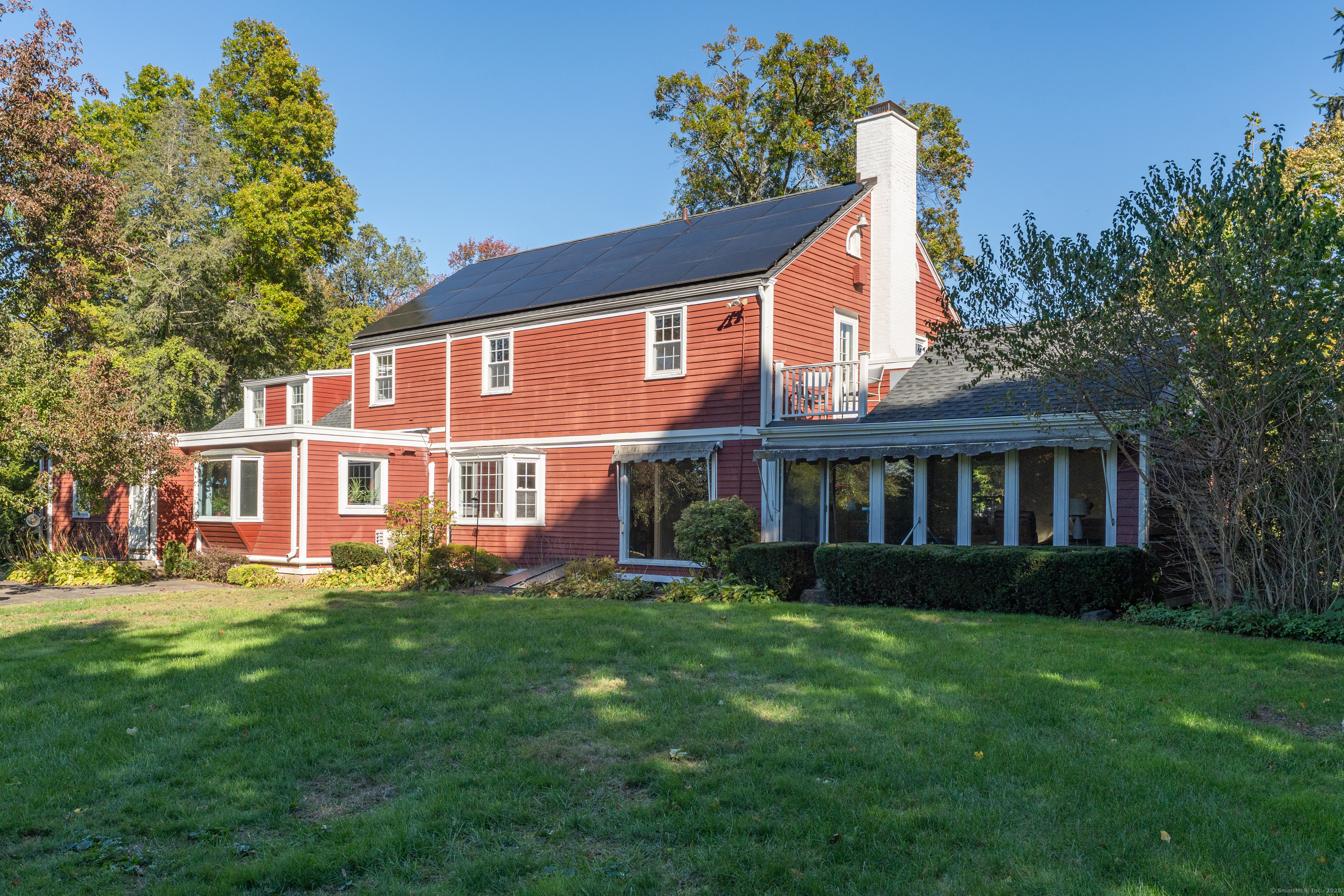 1060 Ridge Road Hamden, CT 06517 - Photo 39 of 40 a front view of a house with a garden
