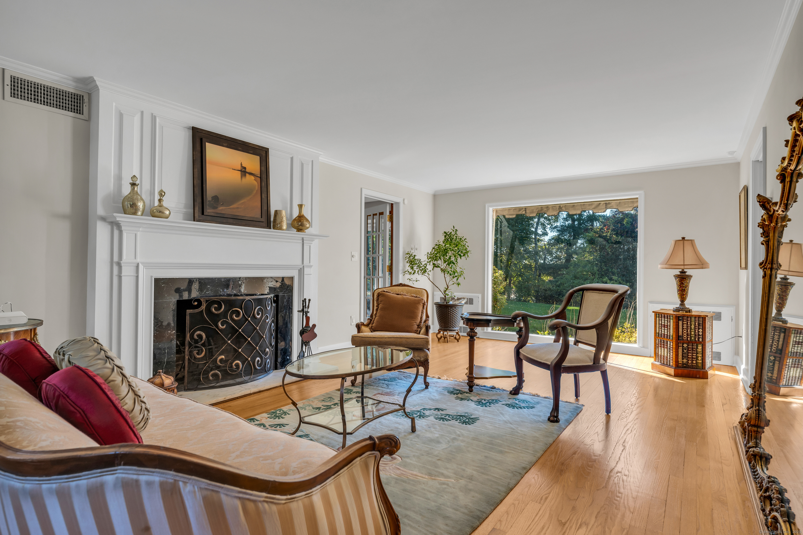 1060 Ridge Road Hamden, CT 06517 - Photo 7 of 40 a living room with furniture and a fireplace
