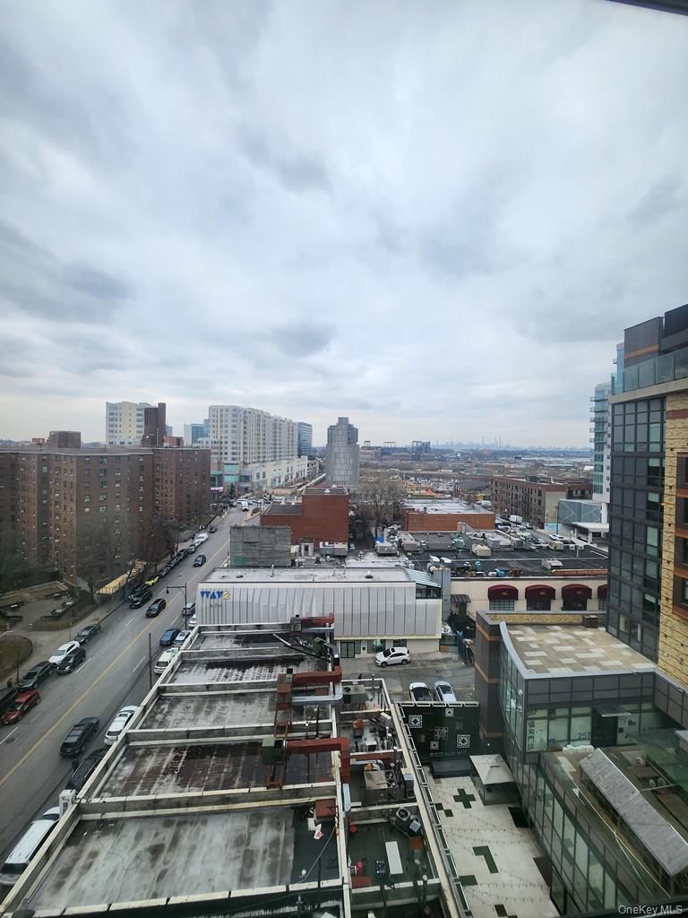 39-16 Prince Street, Unit 9F Queens, NY 11354 - Photo 4 of 8 an aerial view of a city