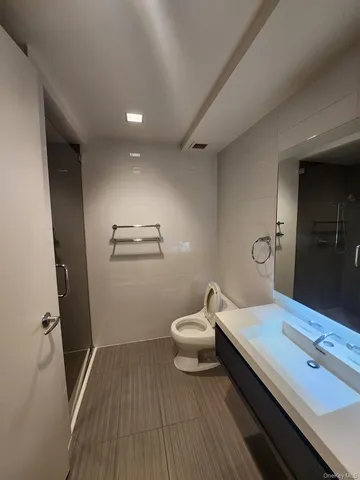 a bathroom with a sink and a toilet