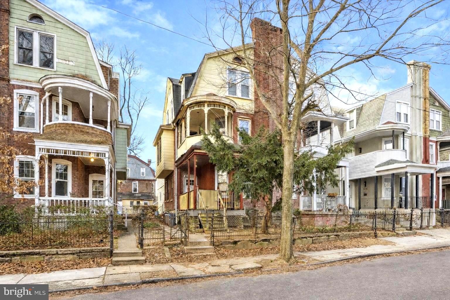 5124 Newhall Street Philadelphia, PA 19144 - Photo 1 of 35 a view of a brick building next to a road