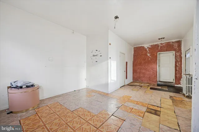 a bathroom with a sink toilet and a mirror