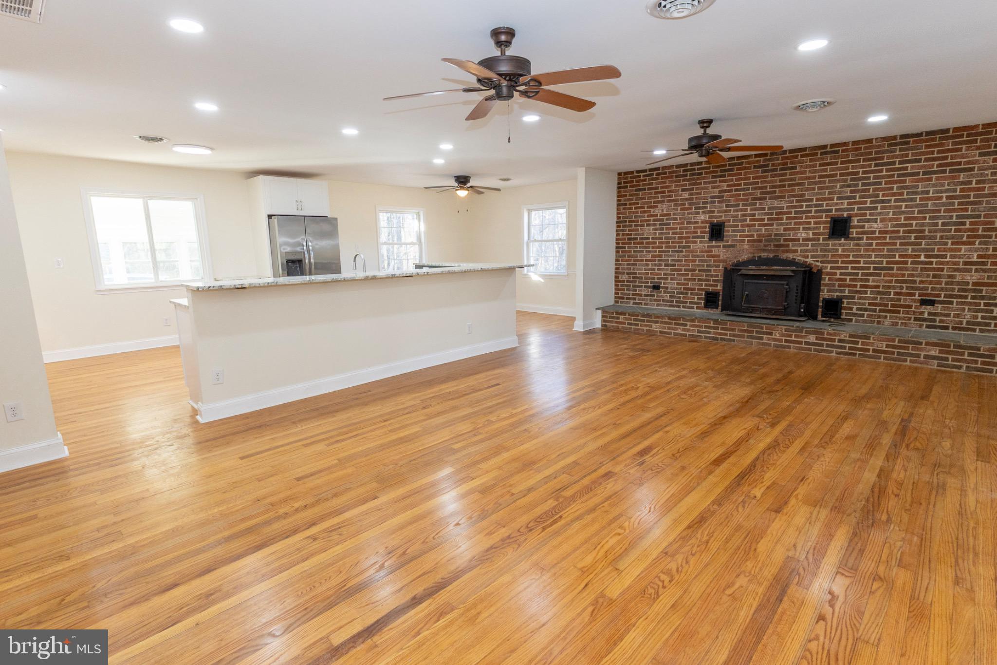 49151 Wynne Road Ridge, MD 20680 - Photo 30 of 80 Spacious living area with rustic charm.