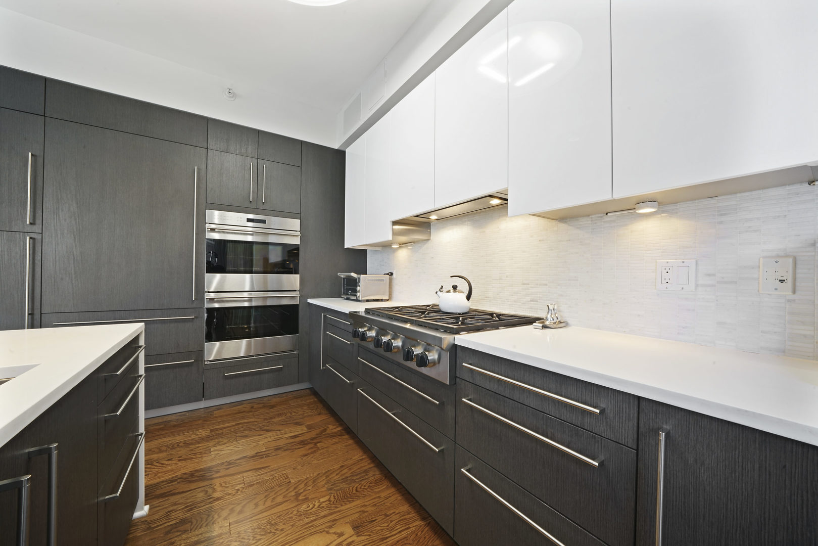 1201 South Prairie Avenue, Unit 601 Chicago, IL 60605 - Photo 11 of 52 a kitchen with a stove and a sink