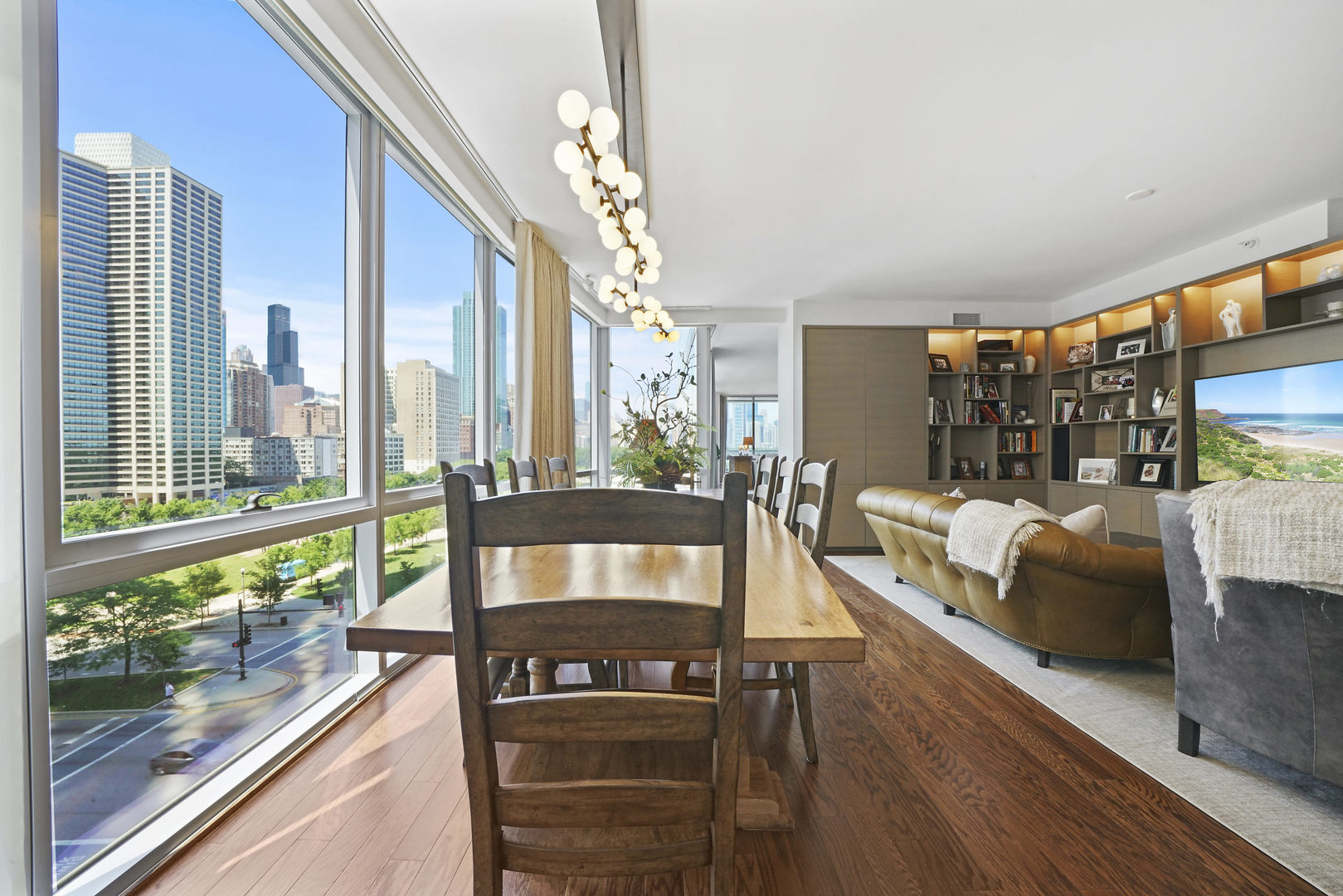 1201 South Prairie Avenue, Unit 601 Chicago, IL 60605 - Photo 14 of 52 a living room with furniture and a floor to ceiling window