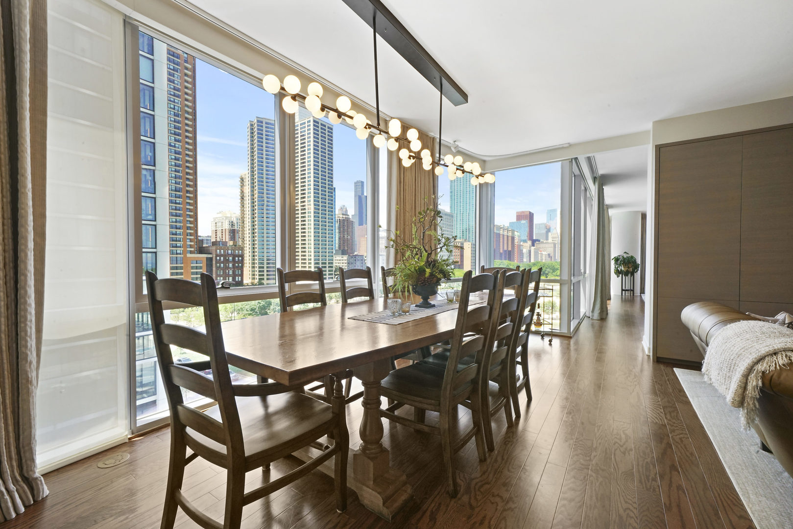 1201 South Prairie Avenue, Unit 601 Chicago, IL 60605 - Photo 15 of 52 a view of a dining room with furniture and window