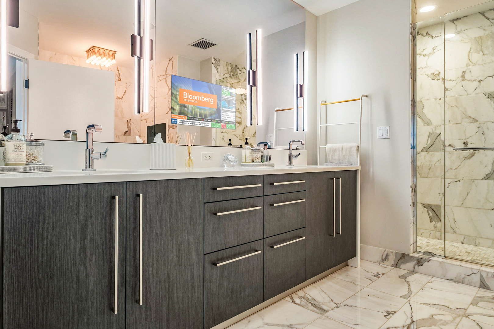 1201 South Prairie Avenue, Unit 601 Chicago, IL 60605 - Photo 20 of 52 a bathroom with a double vanity sink mirror and shower