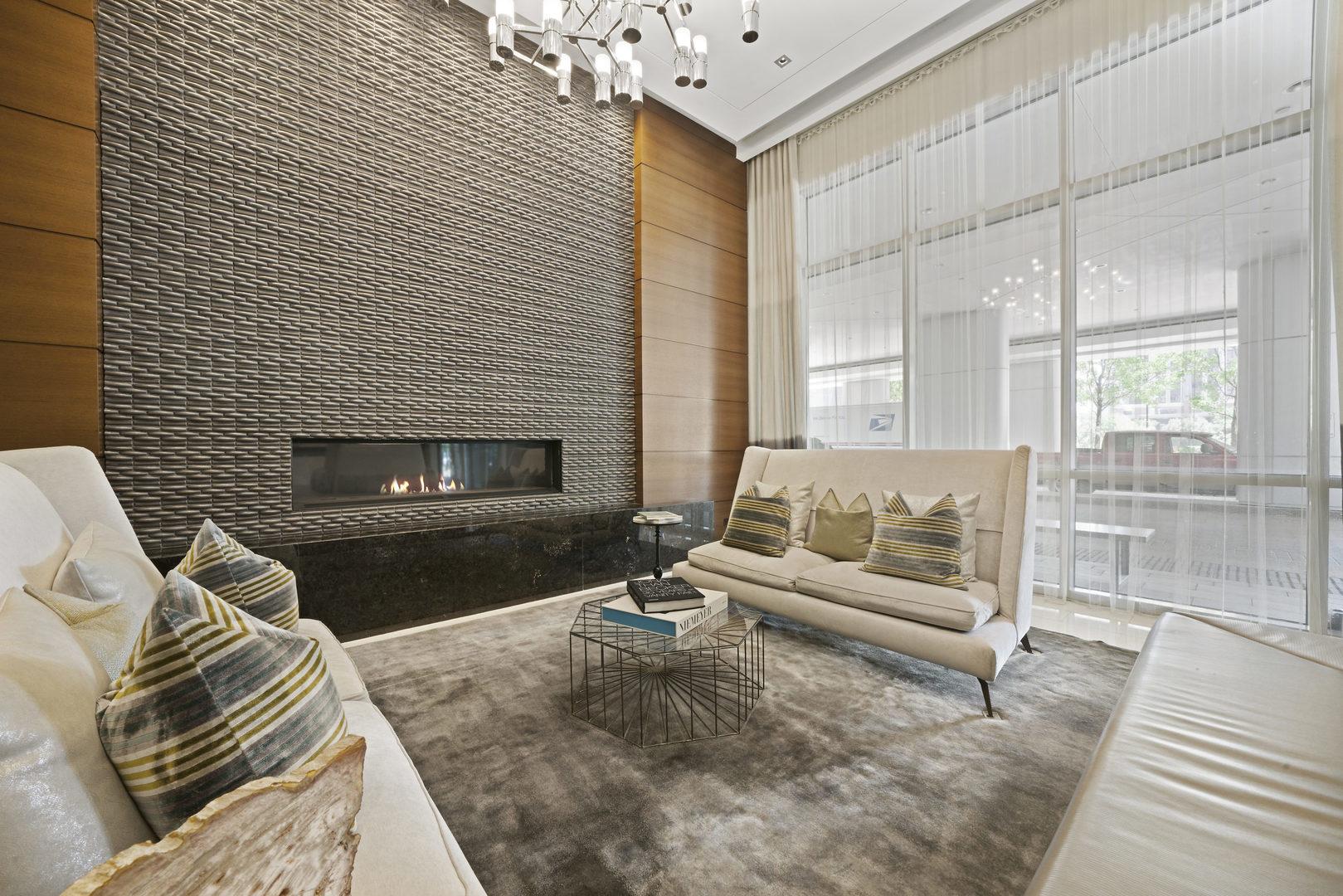 1201 South Prairie Avenue, Unit 601 Chicago, IL 60605 - Photo 28 of 52 a living room with furniture and a fireplace