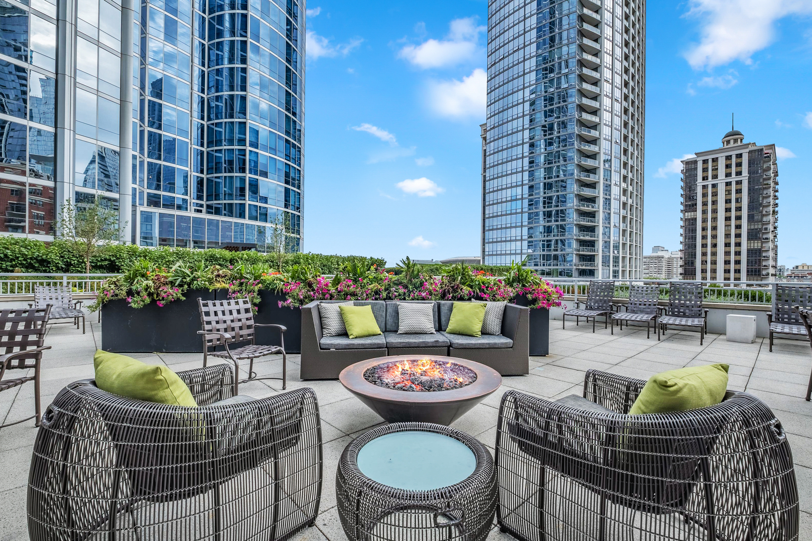 1201 South Prairie Avenue, Unit 601 Chicago, IL 60605 - Photo 45 of 52 a view of a patio with couches table and chairs