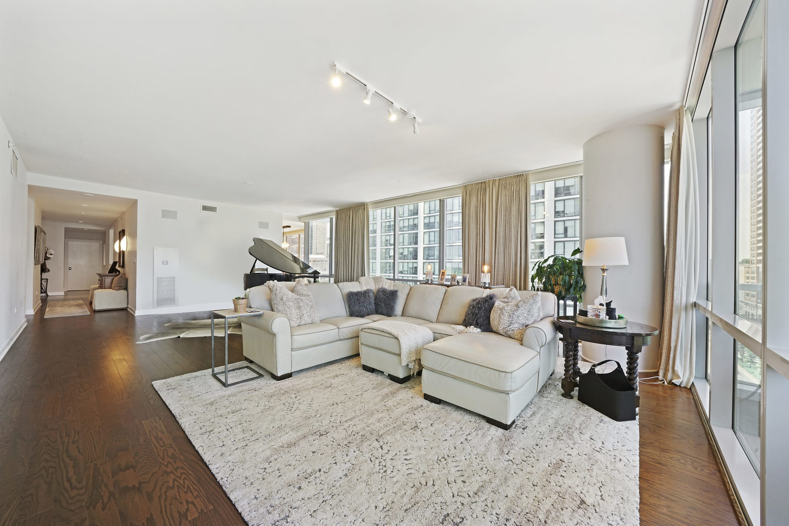 1201 South Prairie Avenue, Unit 601 Chicago, IL 60605 - Photo 6 of 52 a living room with furniture and a large window