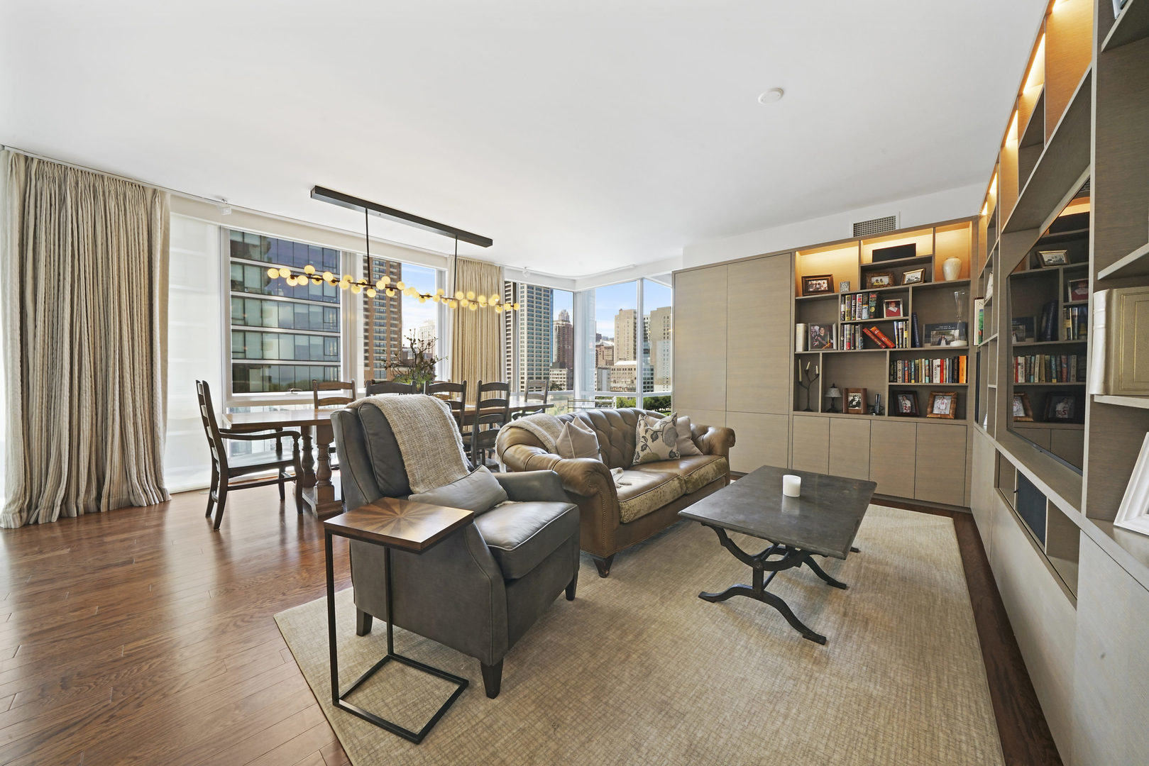 1201 South Prairie Avenue, Unit 601 Chicago, IL 60605 - Photo 9 of 52 a living room with furniture and a large window