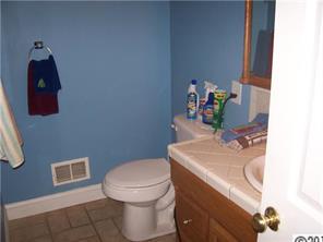 2703 South Point Road Belmont, NC 28012 - Photo 12 of 15 a bathroom with a sink and toilet