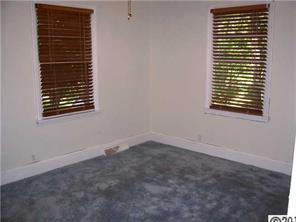 2703 South Point Road Belmont, NC 28012 - Photo 8 of 15 a view of an empty room with a window