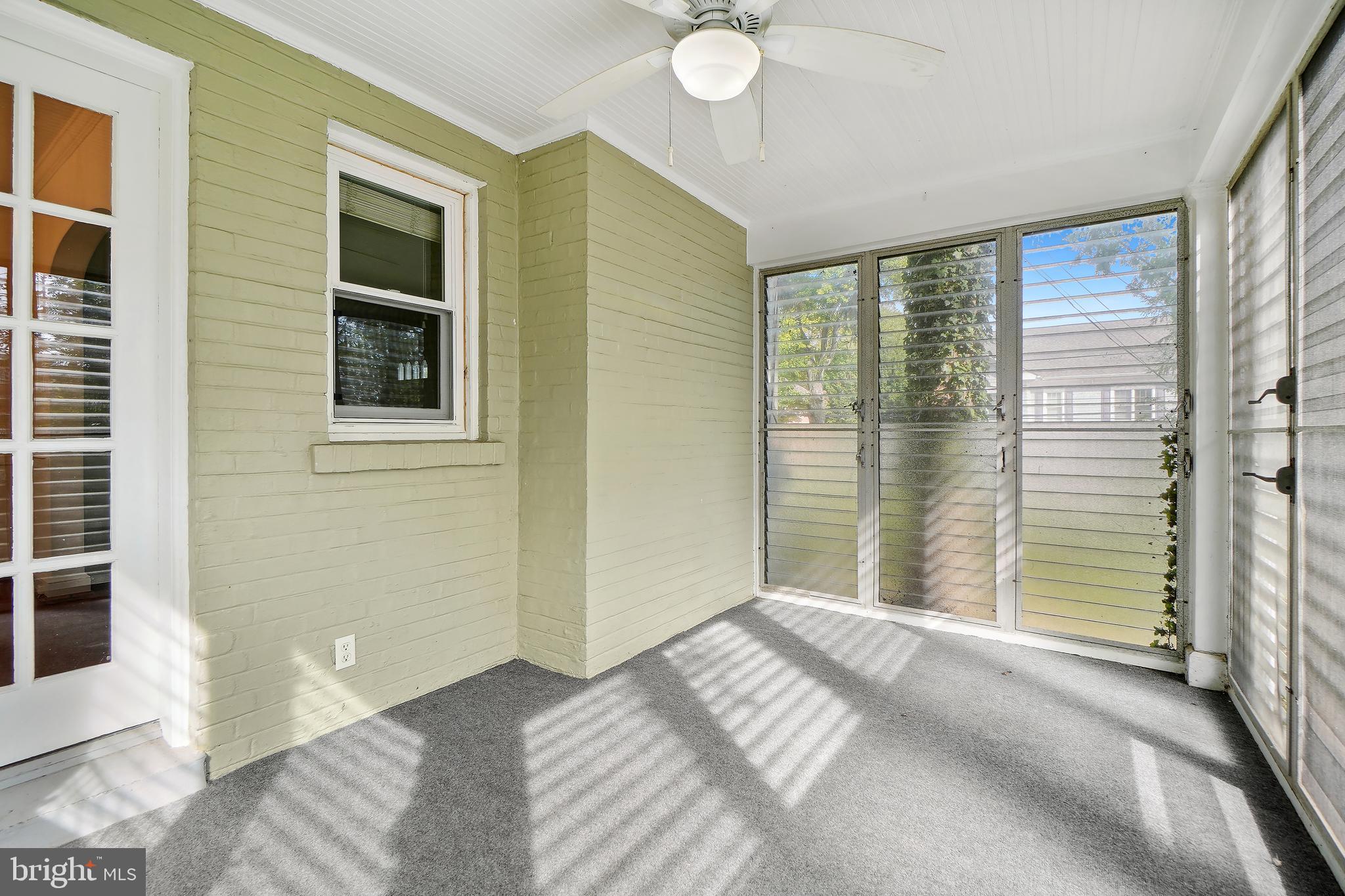 7000 Exeter Road Bethesda, MD 20814 - Photo 15 of 31 a view of a bedroom with a bed and wooden floor
