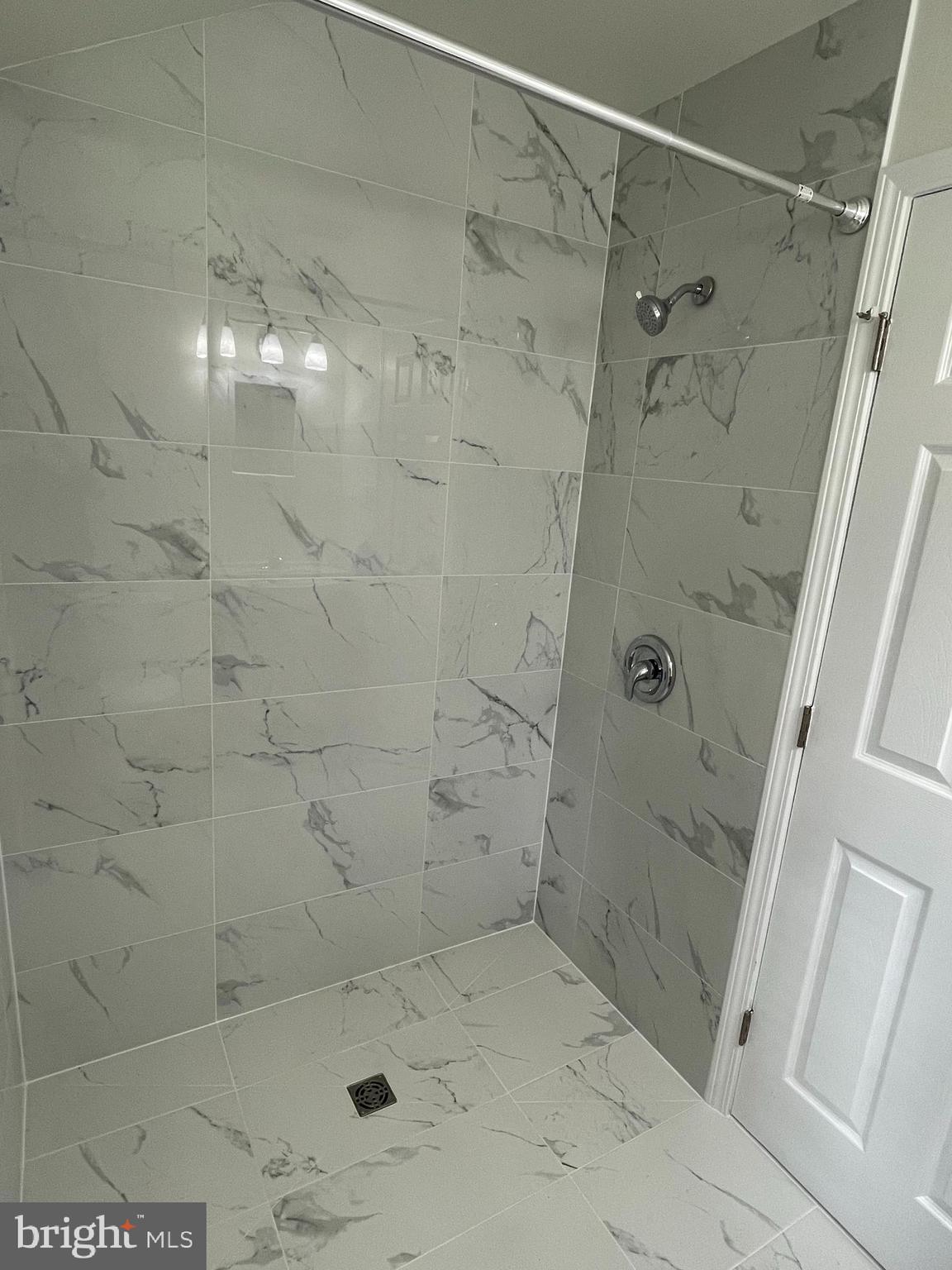 7000 Exeter Road Bethesda, MD 20814 - Photo 19 of 31 a bathroom with a shower