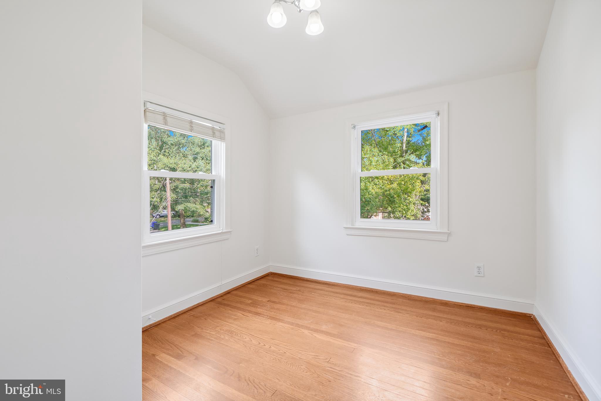 7000 Exeter Road Bethesda, MD 20814 - Photo 24 of 31 an empty room with a window