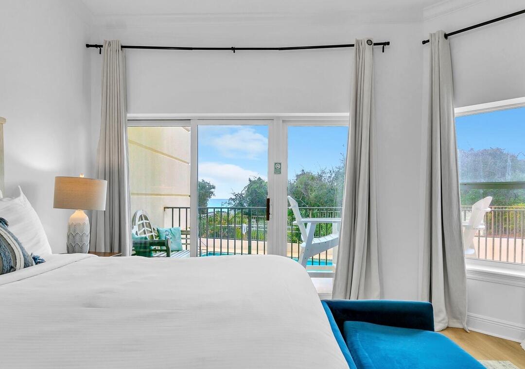 3880 East County Highway 30A, Unit 104 Santa Rosa Beach, FL 32459 - Photo 17 of 49 a bedroom with a bed and a window