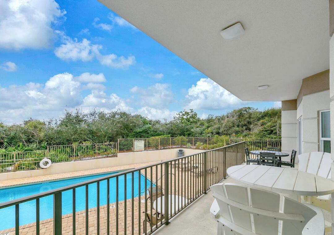 3880 East County Highway 30A, Unit 104 Santa Rosa Beach, FL 32459 - Photo 19 of 49 a view of a balcony with couches