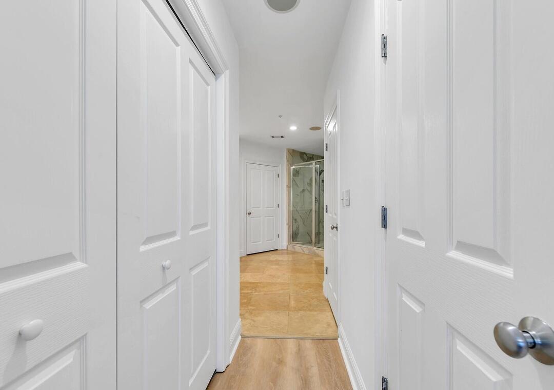 3880 East County Highway 30A, Unit 104 Santa Rosa Beach, FL 32459 - Photo 20 of 49 a view of a bathroom from a hallway