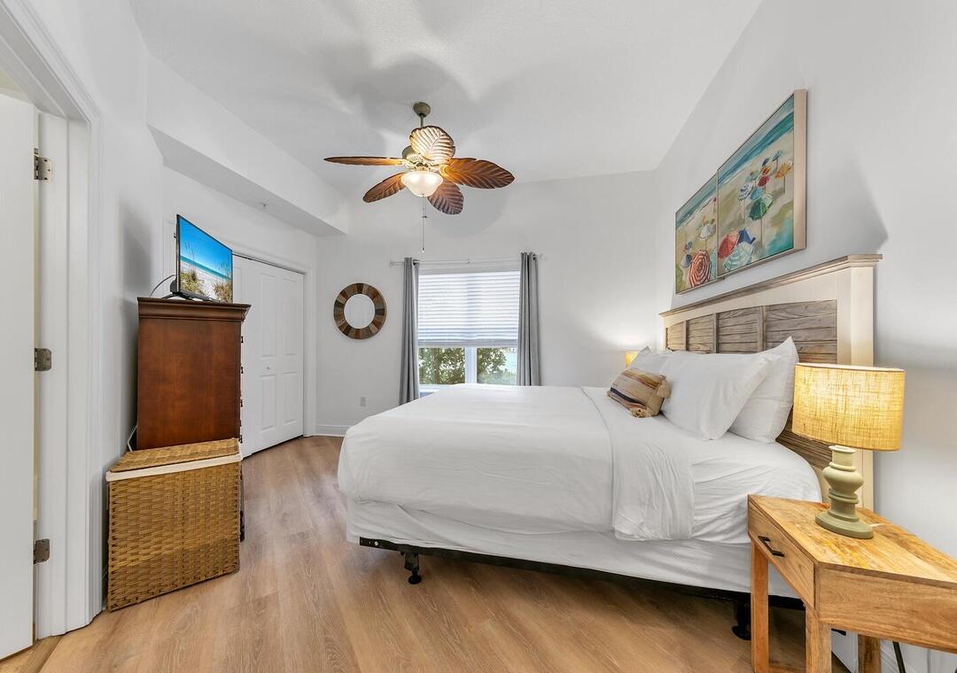 3880 East County Highway 30A, Unit 104 Santa Rosa Beach, FL 32459 - Photo 23 of 49 a bedroom with a bed dresser and window