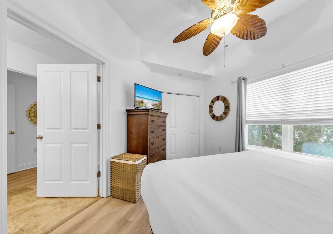 3880 East County Highway 30A, Unit 104 Santa Rosa Beach, FL 32459 - Photo 24 of 49 a bedroom with a bed and a window