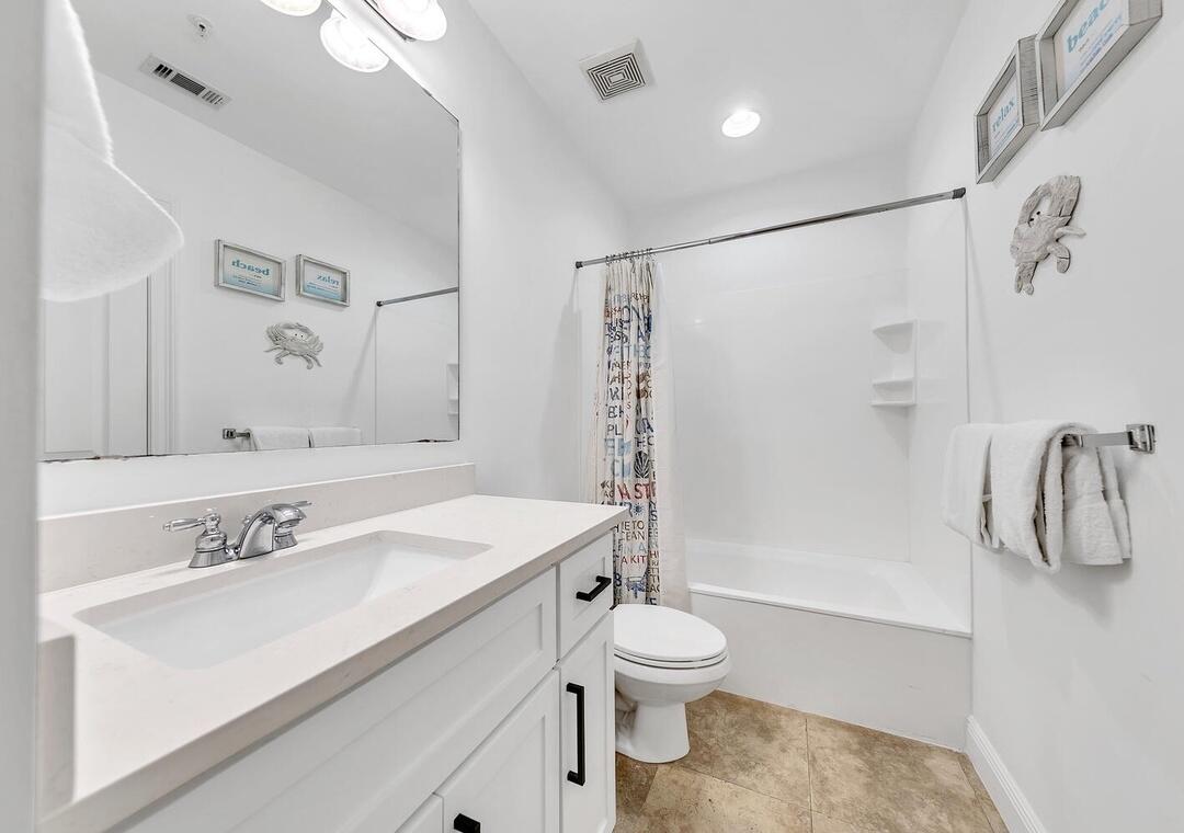 3880 East County Highway 30A, Unit 104 Santa Rosa Beach, FL 32459 - Photo 34 of 49 a bathroom with a sink toilet and shower