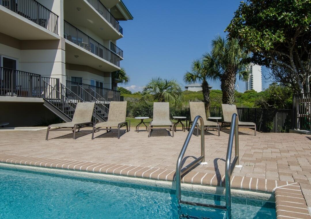 3880 East County Highway 30A, Unit 104 Santa Rosa Beach, FL 32459 - Photo 43 of 49 a view of a backyard with sitting area