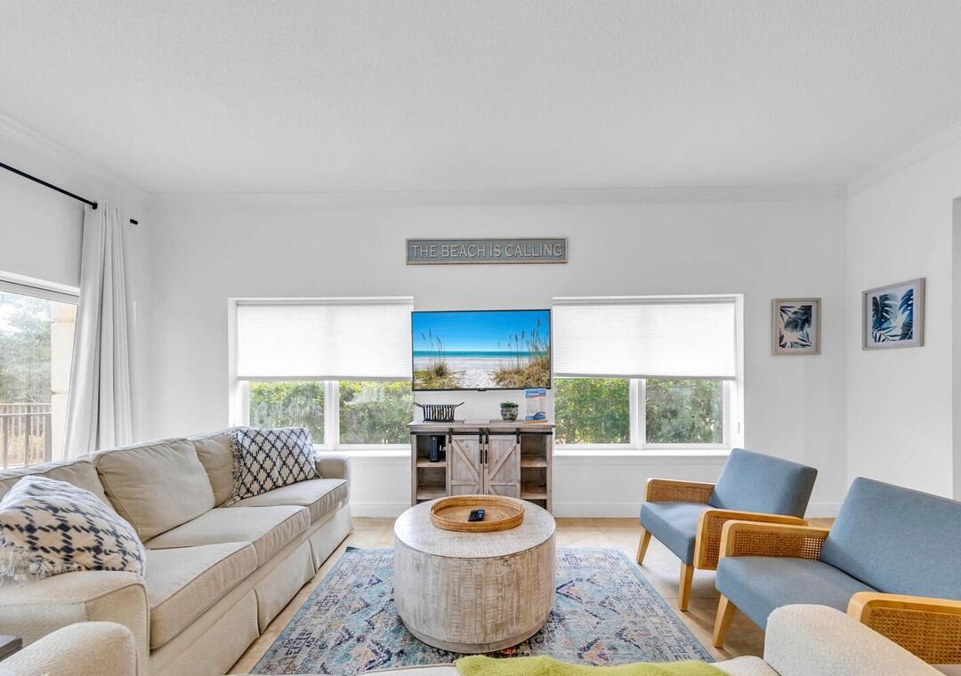 3880 East County Highway 30A, Unit 104 Santa Rosa Beach, FL 32459 - Photo 7 of 49 a living room with furniture and a large window