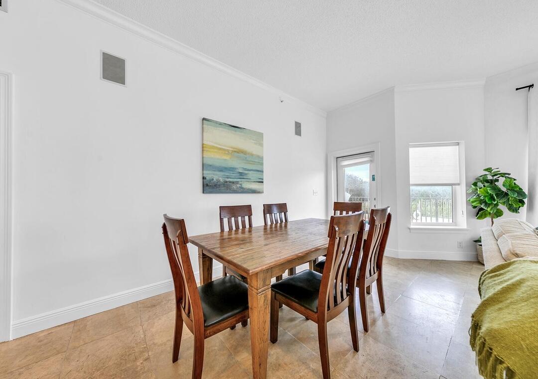 3880 East County Highway 30A, Unit 104 Santa Rosa Beach, FL 32459 - Photo 10 of 49 a dining room with furniture and window