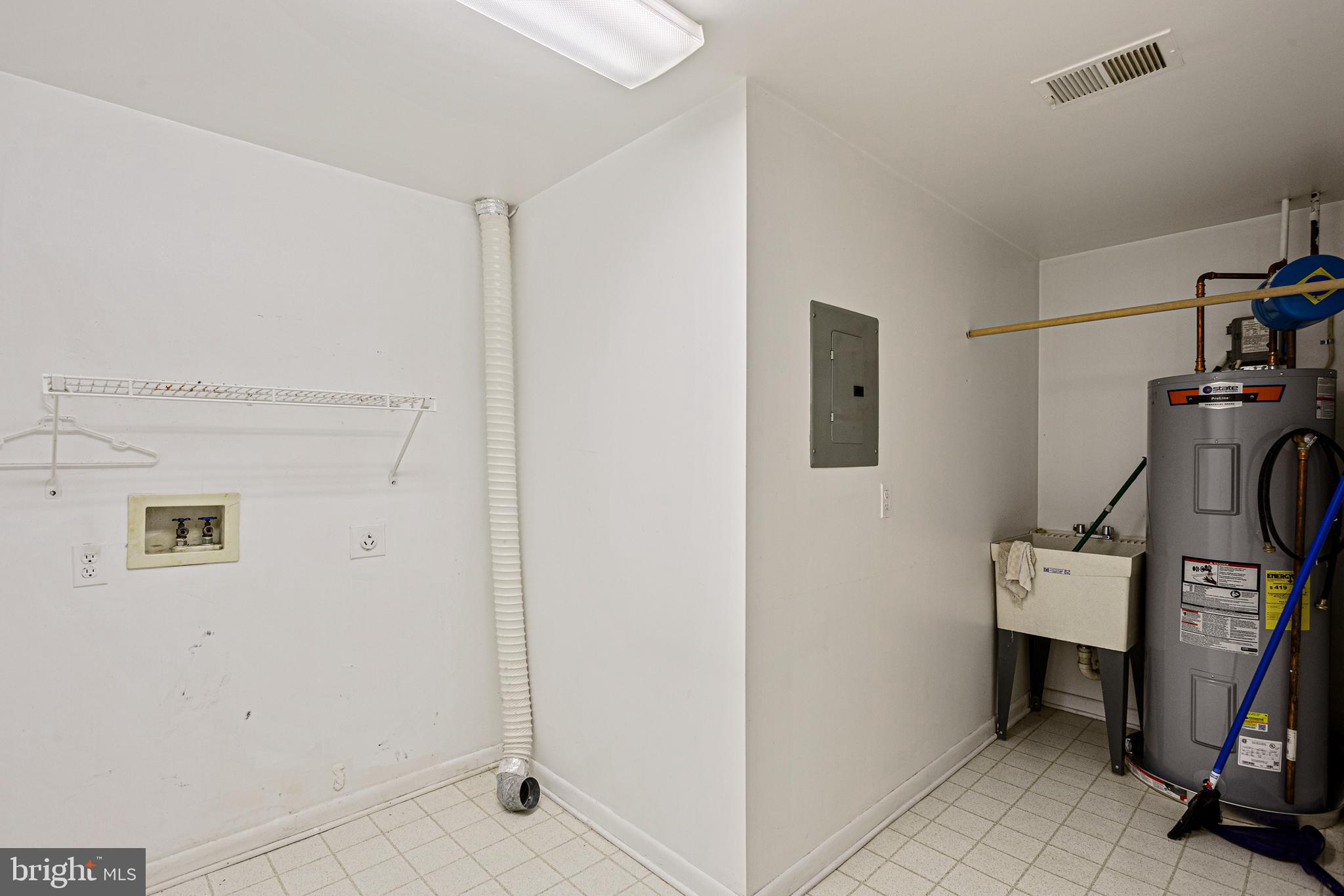 106 Castletown Road, Unit 202 Lutherville-Timonium, MD 21093 - Photo 12 of 13 Utilility Room with hookups and utility sink