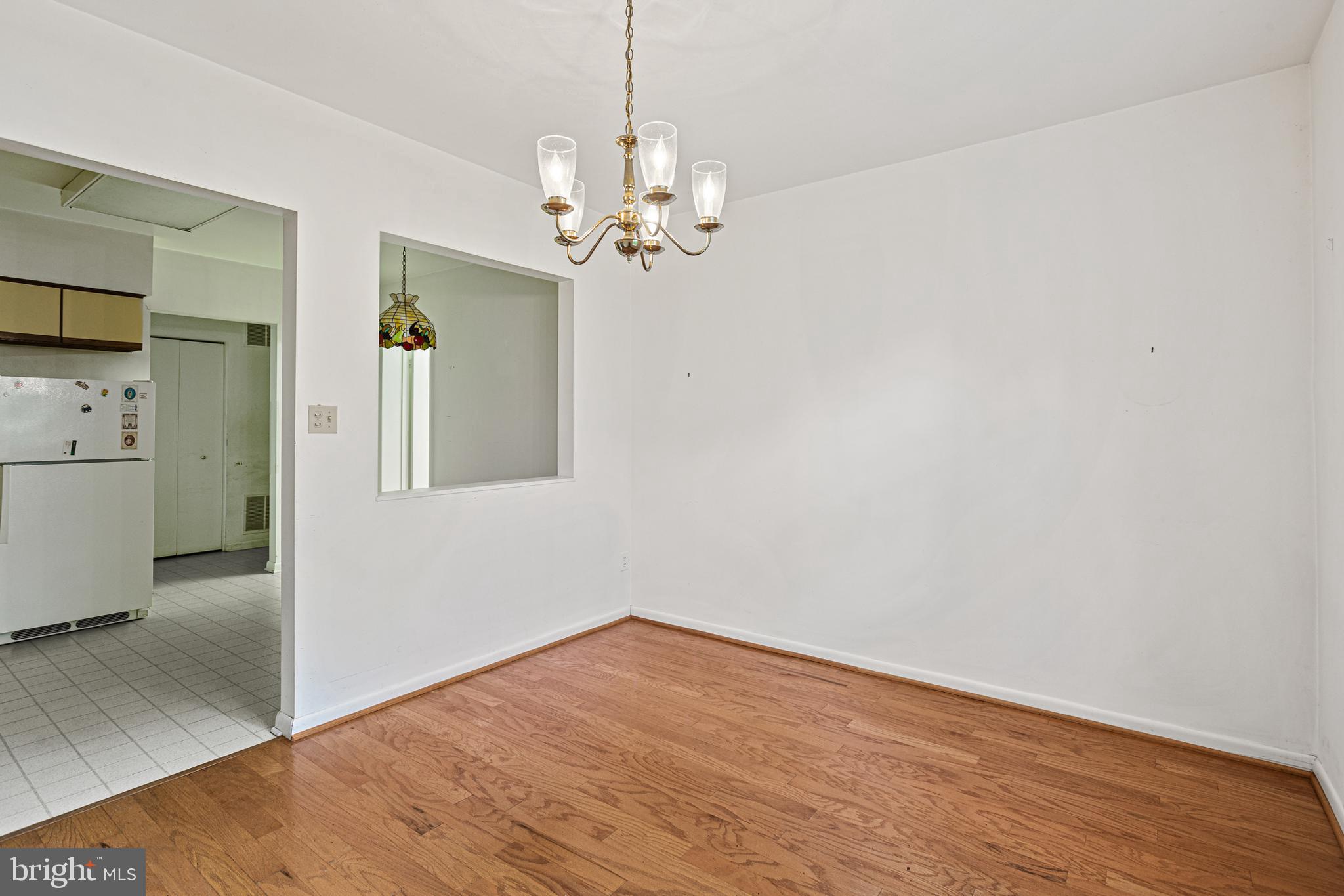 106 Castletown Road, Unit 202 Lutherville-Timonium, MD 21093 - Photo 4 of 13 Dining Room leads to kitchen