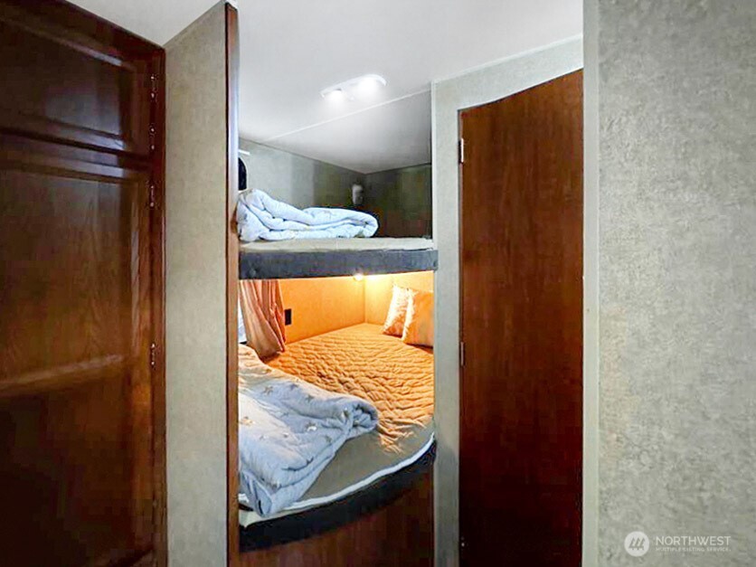 47 Wilderness Way Maple Falls, WA 98266 - Photo 18 of 40 a view of a closet from a bathroom
