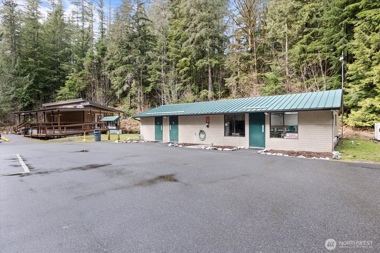 47 Wilderness Way Maple Falls, WA 98266 - Photo 36 of 40 a view of a house with a patio and a yard