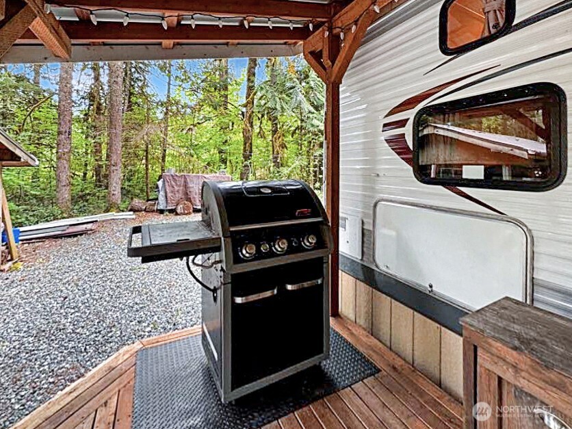 47 Wilderness Way Maple Falls, WA 98266 - Photo 6 of 40 a view of a two chairs in the balcony