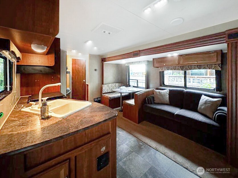 47 Wilderness Way Maple Falls, WA 98266 - Photo 7 of 40 a living room with furniture and a large window