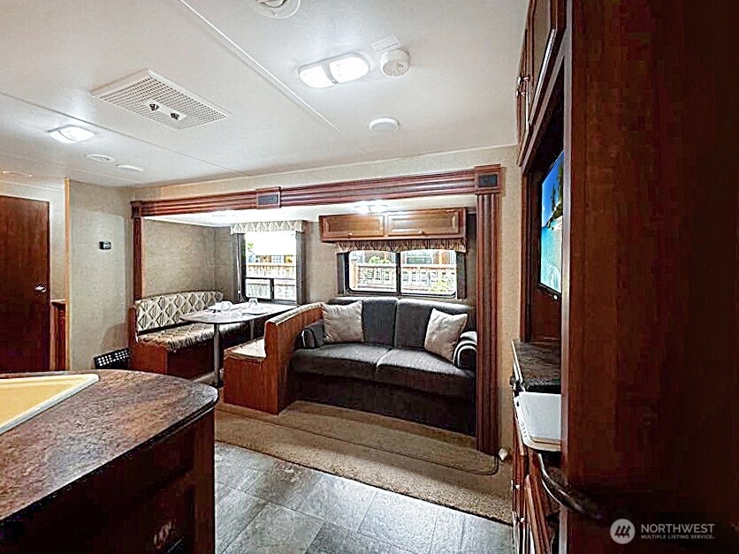 47 Wilderness Way Maple Falls, WA 98266 - Photo 8 of 40 a living room with furniture and a large window