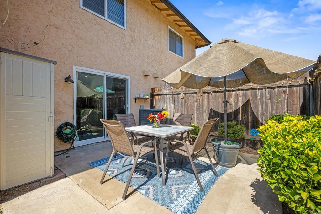 10323 Restful Court Santee, CA 92071 - Photo 16 of 30 a patio with a table and chairs