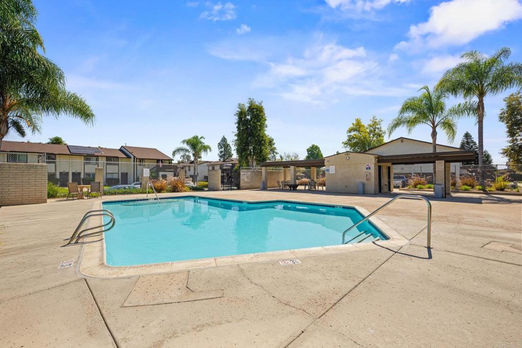 10323 Restful Court Santee, CA 92071 - Photo 20 of 30 a view of a swimming pool with a lounge chairs