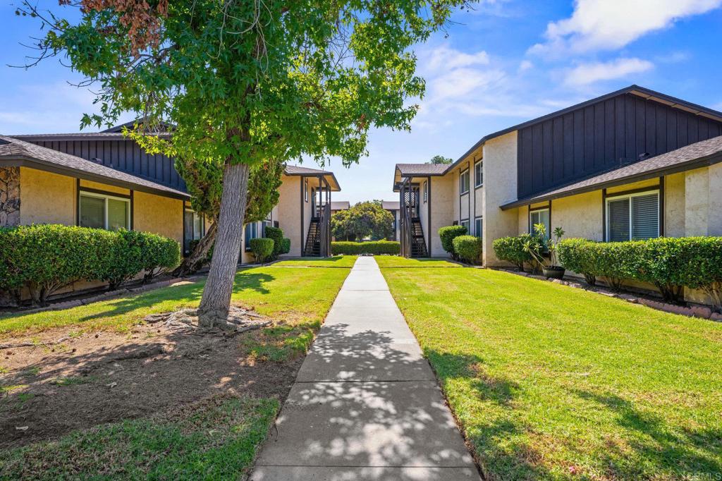 10323 Restful Court Santee, CA 92071 - Photo 24 of 30 a view of backyard with swimming pool and outdoor seating